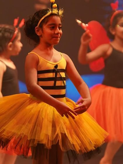 A close-up of one of our happy bees. The joy on their faces is what makes all the hard work worth it.