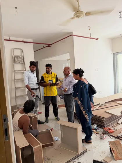A full view of the worksite, with my team, clients, and carpenters all present and collaborating.