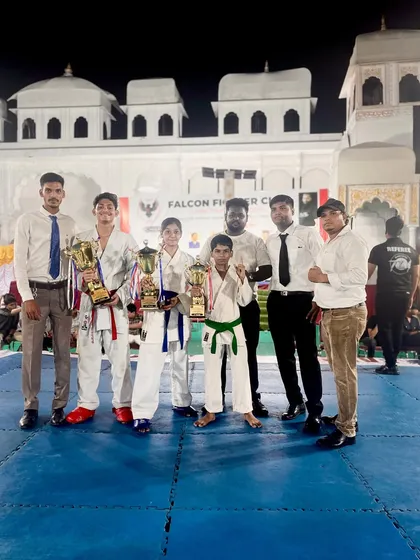 The winning team and coaches together after a successful competition. We train as a team and we win as a team. This picture captures the spirit of our dojo.