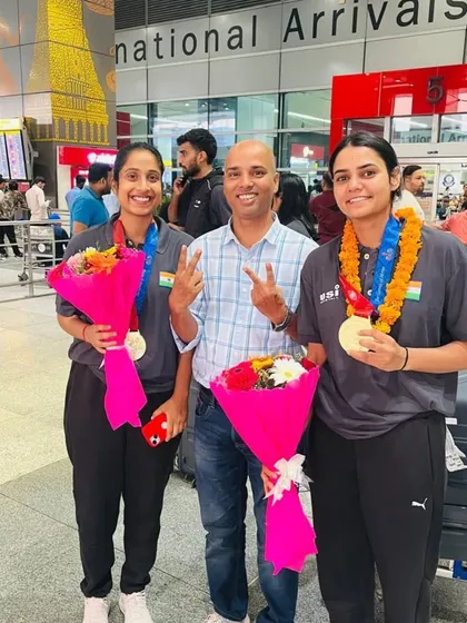 Victory signs for our victorious athletes. The smiles on their faces show the result of immense hard work and dedication.