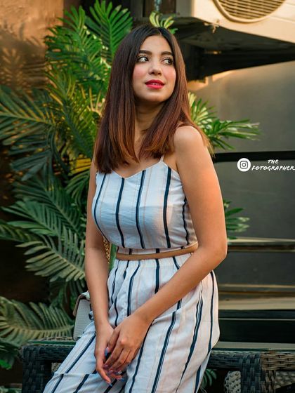 A candid moment from the same lifestyle session, capturing a natural glance away from the camera.