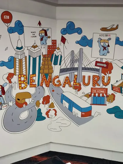 For the Xiaomi India office, we created a custom doodle mural that tells the story of Bengaluru. It's packed with local landmarks, from the Vidhana Soudha to the BMTC bus, all tied together with the fun Mi bunny mascot.