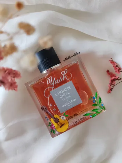 Turning a simple gift into a cherished keepsake. This Guerlain perfume bottle was personalized for 'Yash' with his name and a hand painted guitar, reflecting his personality and passions.