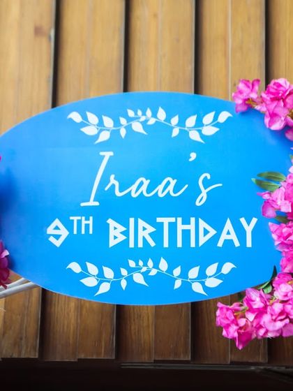 A personalized birthday sign for Iraa's 9th birthday, setting the stage for her creative party.