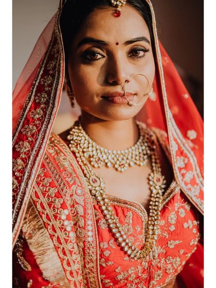 A powerful, direct portrait of the bride, Kavita. Her eyes tell a story of strength, beauty, and anticipation.