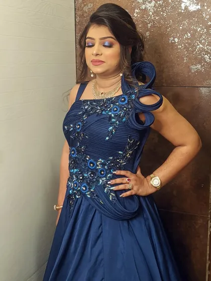 A glamorous look in a royal blue gown. I created a matching blue smokey eye to make a bold statement.