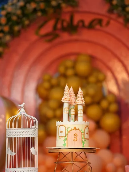 A close-up of the castle-themed cake for Soha's third birthday, perfectly matching the grand castle backdrop.