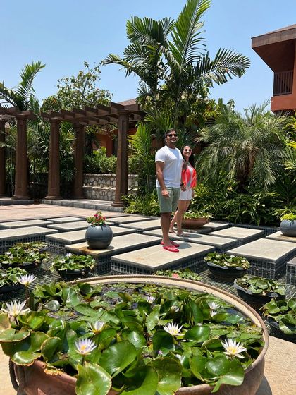 A couple stands on the floating platforms over our lily pond. This guest-captured moment perfectly illustrates the romantic and picturesque setting I offer for a memorable getaway.