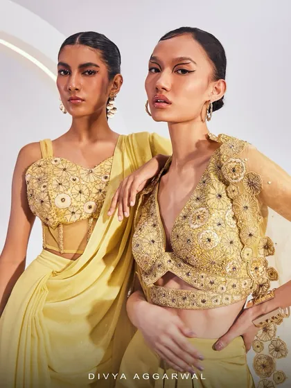 A group shot featuring the Lydia Cape Set and Isla Saree Set, sparking inspiration with their exquisite craftsmanship and modern design.