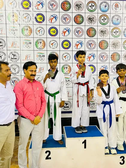 Dhairya with his silver medal at the Delhi State Championship. We celebrate every victory as a team.