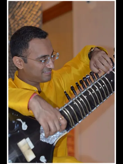 A detailed shot of my hands on the instrument.