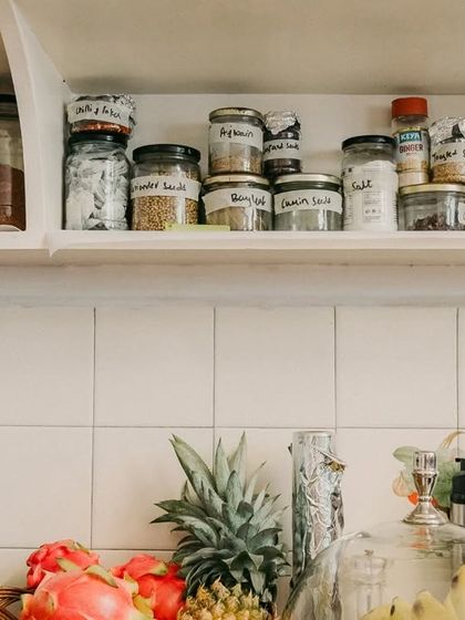 A sneak peek into our kitchen pantry. We keep our shelves stocked with a variety of spices and whole foods, ready to be transformed into your next nourishing meal.