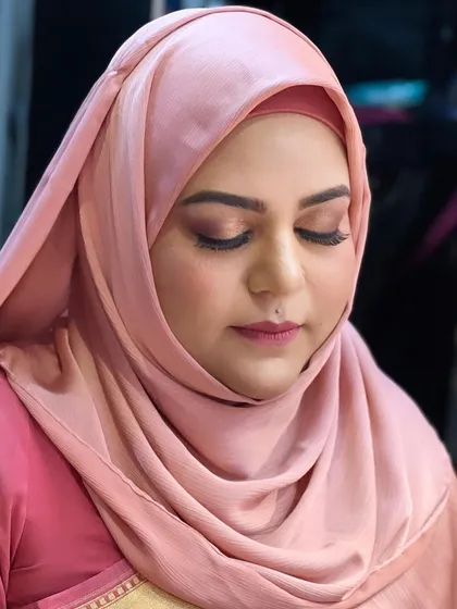 A gorgeous client in a hijab and saree. I created a soft, glowing makeup look that respected her choice to wear a hijab.