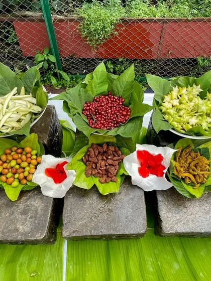 A full view of the 'Bachpan ki Yaadein' counter, with a variety of traditional Indian sour and sweet treats beautifully displayed in leaf bowls. It's a unique concept that guests always remember.