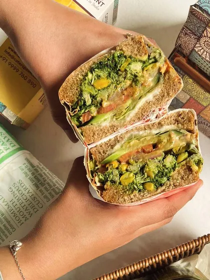 Our Corn Cheese Sarson Da Saag sandwich is a seasonal special you don't want to miss. It's a healthy, innovative take on a classic, served on multigrain bread.