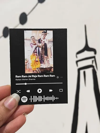 This Spotify card features a traditional Marathi wedding photo paired with a devotional song. It’s a wonderful way to commemorate a sacred moment.