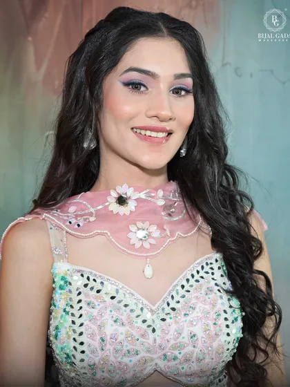 A beautiful portrait showcasing the pastel makeup look. The soft colors on the eyes and cheeks enhance the model's features without looking heavy.