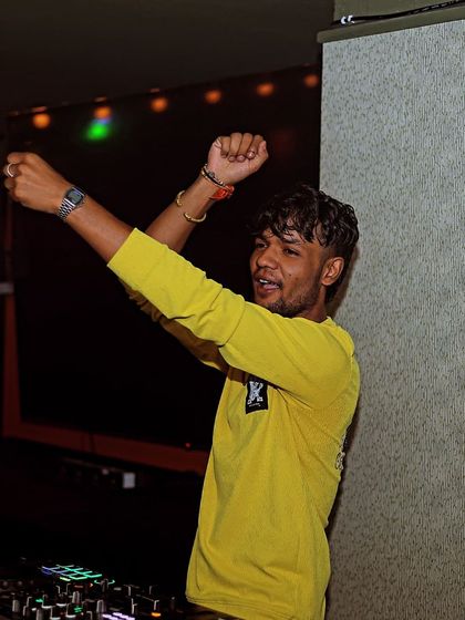 Hands up! Making memories on the dance floor is what it's all about. A great shot of me connecting with the weekend crowd.