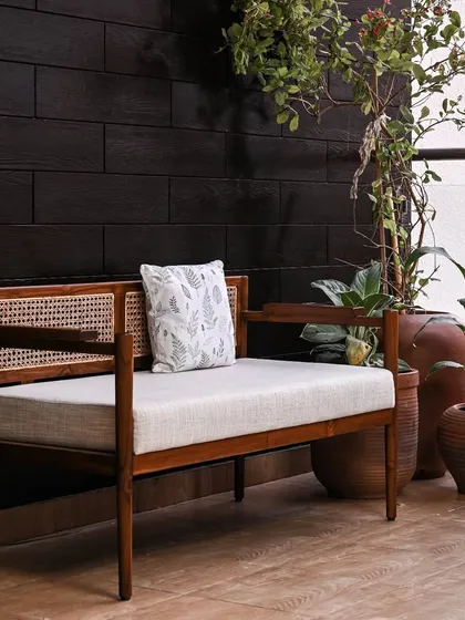 Our range of benches, including the Svasa 2-seater and the slender Temple Tree bench. These pieces are perfect for entryways, balconies, or as complementary seating in a larger living area.