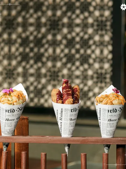 A different angle of our appetiser cones, showing the variety of textures and toppings. This is how we make pass around food fun, interactive, and delicious.
