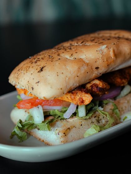 We're bringing an Indian twist to the classic Italian sandwich with our Chicken Tikka Panini. It's packed with tender chicken tikka and fresh veggies in a toasted panini.
