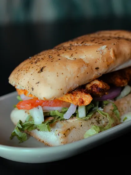 We're bringing an Indian twist to the classic Italian sandwich with our Chicken Tikka Panini. It's packed with tender chicken tikka and fresh veggies in a toasted panini.