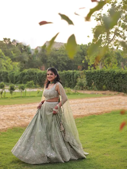 Having a main character moment as the sister of the groom. I chose this elegant sage green lehenga from Matsya World for the engagement ceremony, a soft and sophisticated look.