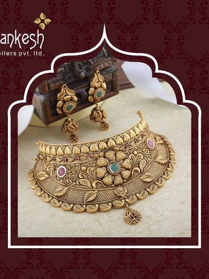 An antique-finish choker with floral motifs and coloured gemstones. This piece combines traditional carving with the popular choker style for a timeless yet fashionable look.