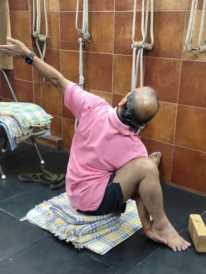 A seated twist on blankets.