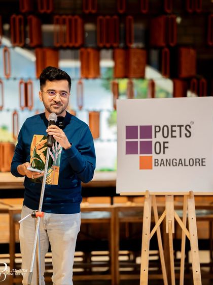 A smiling performer at our "Wheel of Life" themed meetup. These events are a testament to the power of a shared theme to inspire creativity.