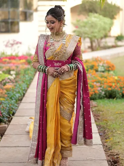 Walking through the garden, this bride is a picture of grace. The soft, natural makeup is perfect for an outdoor ceremony, ensuring she looks fresh and radiant.