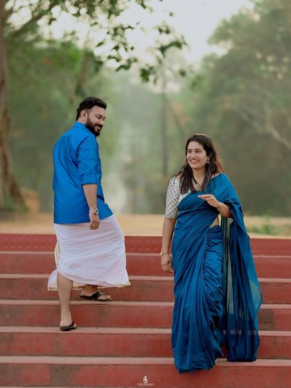 A fun, unposed moment on the stairs. Capturing these genuine interactions is what makes a photoshoot memorable.
