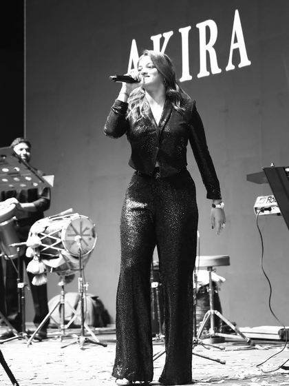 A classic black and white shot from a corporate gig. Even in a formal setting, the goal is always to connect with the audience and fill the room with music and joy.