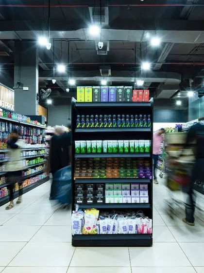For the Shopprix supermarket, I designed wide, clean aisles with strategic lighting to create an inviting and easy-to-navigate shopping experience. The motion in this shot captures the dynamic energy of a well-functioning retail space.