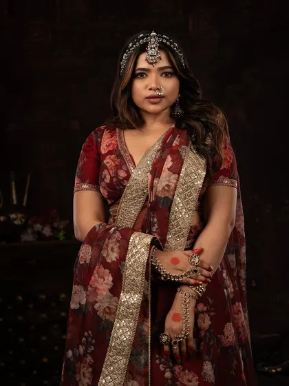 The model embodying the character from our Heeramandi-inspired shoot. The makeup is designed to be both beautiful and expressive, fitting the royal and artistic theme.