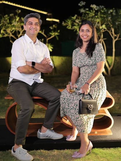 Our partners posing with the SWISH bench, a piece that represents our passion for pushing the boundaries of material and form.