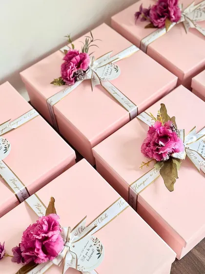 The packaging for my luxury bridesmaid hampers is kept minimalistic yet elegant, with custom ribbons and a beautiful floral accent to speak volumes.