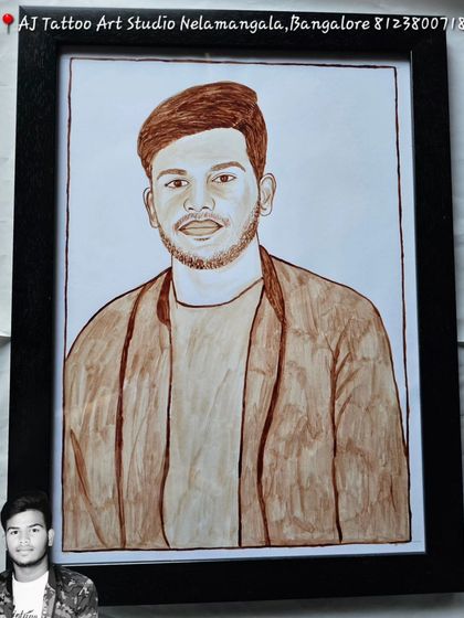 This image shows the final portrait next to the reference photo in the corner, demonstrating the accurate likeness I achieve in my hand-painted blood portraits.