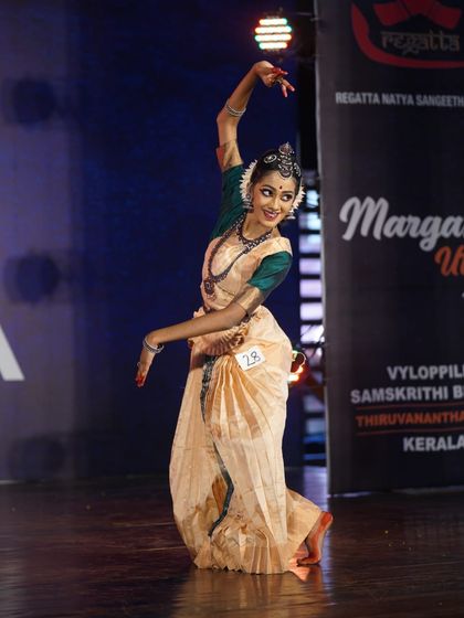A graceful and fluid pose from a senior student. Her elegant performance earned her a 2nd place award in the senior category.