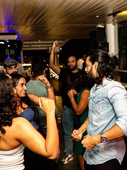 The dancefloor in full swing, with people showing off their best moves.