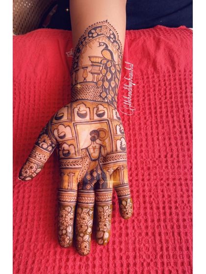 A single hand from a Karwa Chauth set, showing a woman in traditional attire with diyas, celebrating the festival of lights and love.