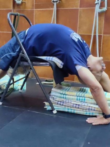 A supported backbend with blankets.