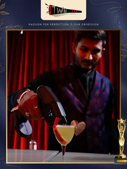 A bartender crafting a drink at the WeddingSutra awards night, where we were also the beverage partners.