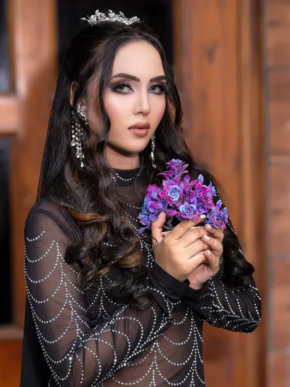 Creating art on every face. This look is a perfect example of Arabian glam.