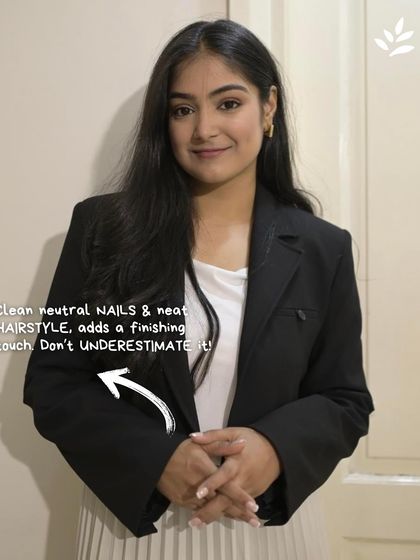 The details make the difference in a professional look. Clean, neutral nails and a neat hairstyle provide a crucial finishing touch that communicates polish and attention to detail. Don't underestimate their power.