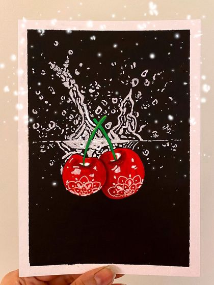 I experimented with negative space in this piece, drawing the splash of water in white on a black background. The cherries have a subtle mandala pattern, adding a touch of my signature style.