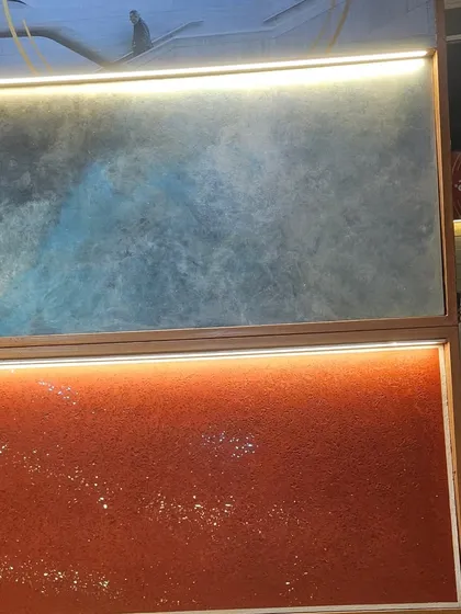 Some of the crazy and cool new wall finishes launched by Arrcoat. These panels showcase abstract textures and colors, from cosmic blues to earthy reds.