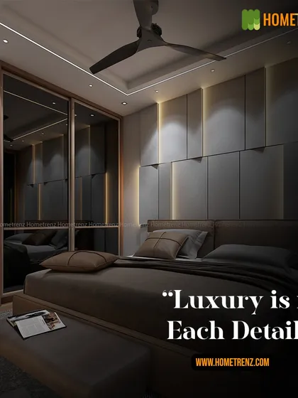 Luxury is in each detail. This bedroom features a dark, paneled accent wall with integrated vertical lighting, a smoked mirror wardrobe, and a low-profile upholstered bed, creating a sleek and opulent retreat.
