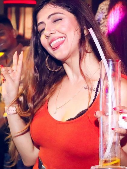 The energy of a ladies' night is unmatched. I curate my playlists to make sure everyone feels the vibe, with free drinks and the best Bollywood tracks to get the party started.
