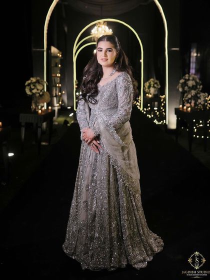 A full-length view of the stunning engagement look.